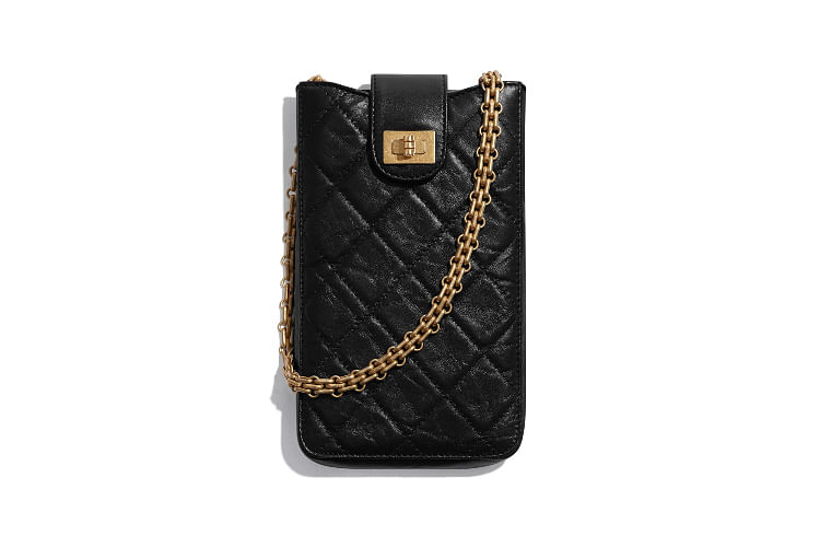 The Must-Have SLG Of The Moment: The Branded Phone Case Sling Bag