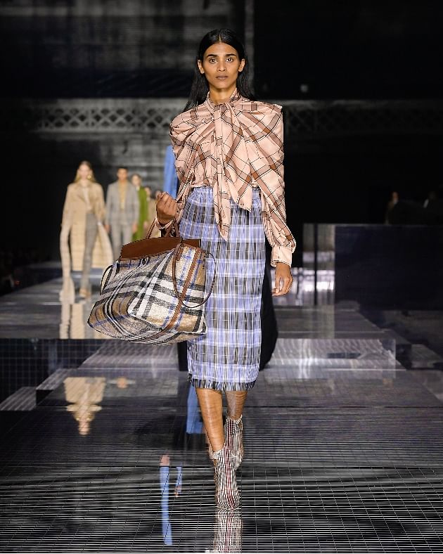 South Korean model Sora Choi walks the runway at the Versace fashion show  Spring Summer 2022.