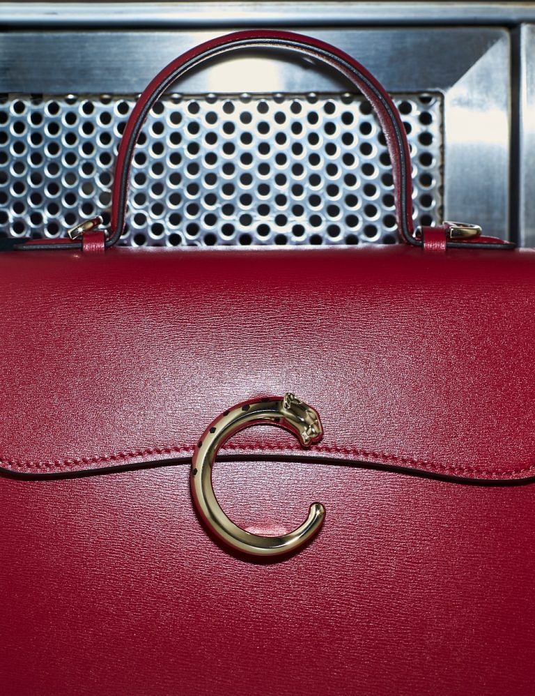 The Panthere de Cartier Top Handle Bag Is Made For Work And Play