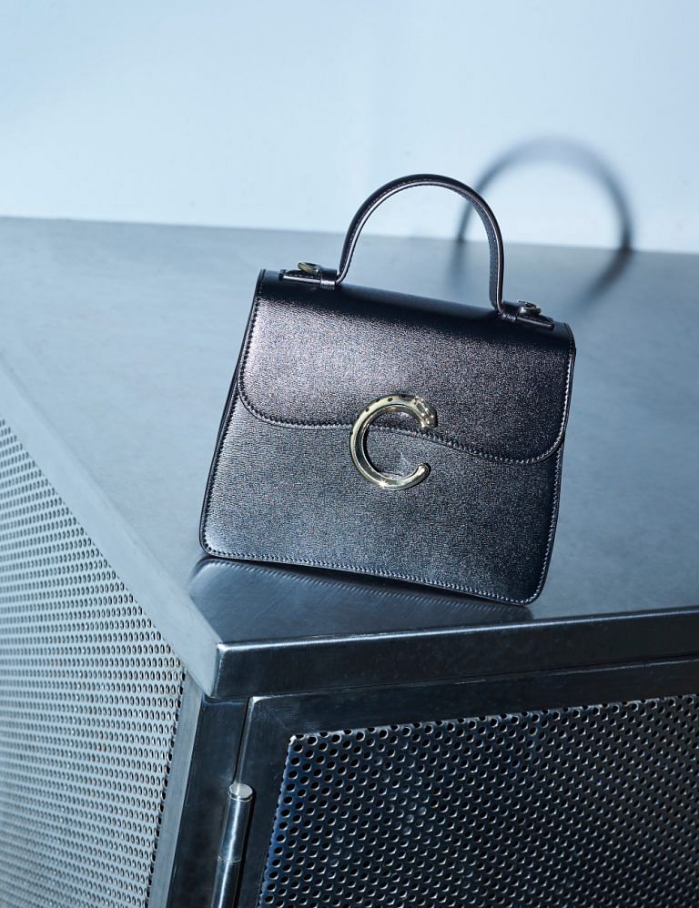 The Panthere de Cartier Top Handle Bag Is Made For Work And Play