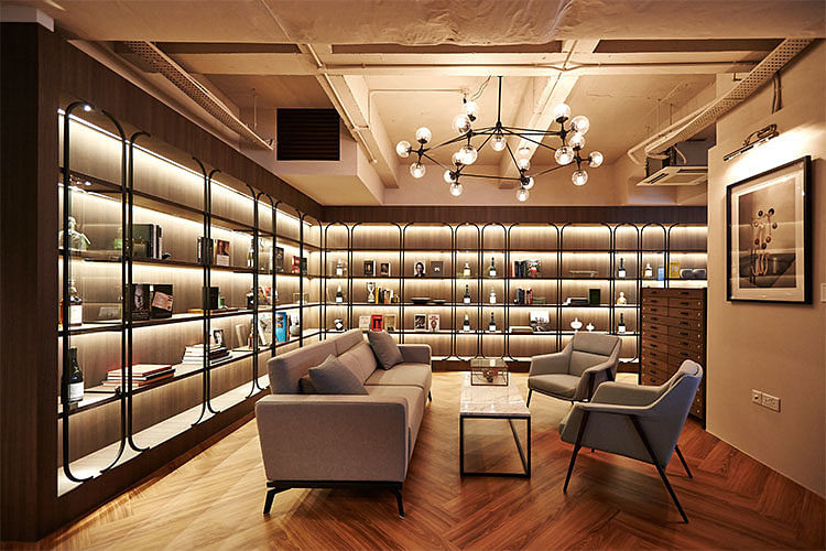 Collision 8’s plush-meets-fun facilities include a library that resembles a private club.