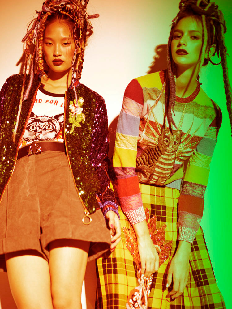 (Left) Embroidered cotton bomber jacket with sequins, and matching T-shirt, Gucci. Denim shorts, Chanel. Leather belt, Dsquared2. (Right) Embroidered wool and lace jumper, and matching wrap skirt, Gucci