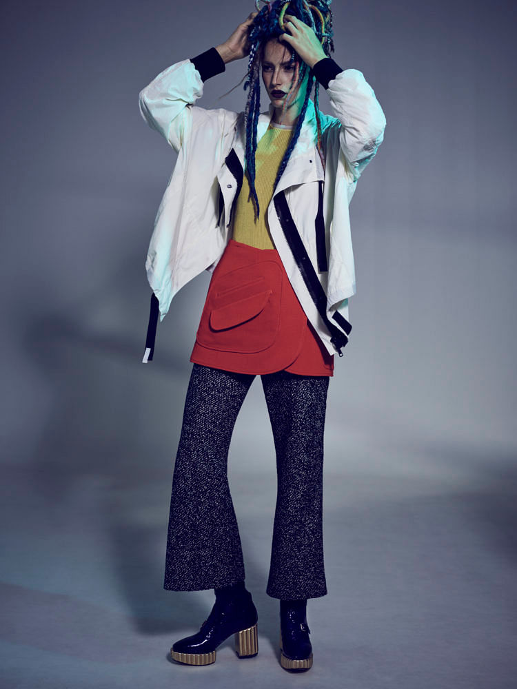 Polyester-blend hooded jacket, DKNY. Viscose-blend T-shirt, wool miniskirt, matching flared pants, and leather booties, Dior